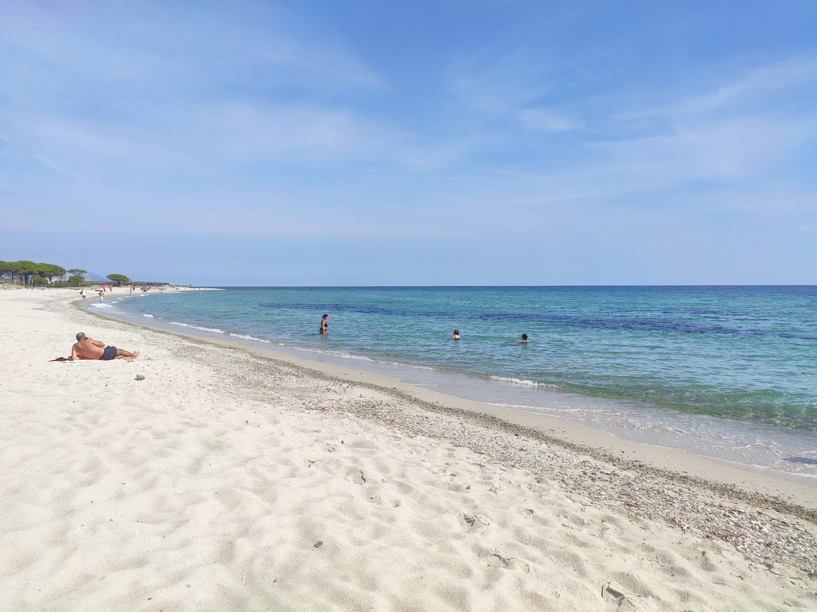 Foto van Spiaggia per Cani met helder fijn zand oppervlakte