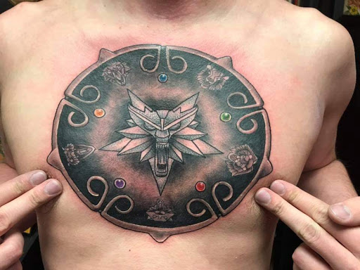 Explore mandalorian tattoo ideas, creative tattoo ideas in Powell, available at Against All Odds Tattoos and Piercings