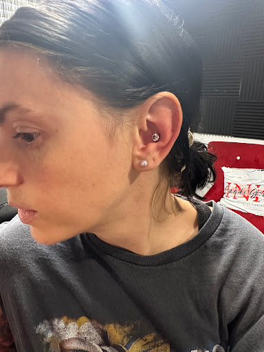 Explore name placement tattoo ideas, creative tattoo ideas in Blackwood, available at Candi Girl Ink