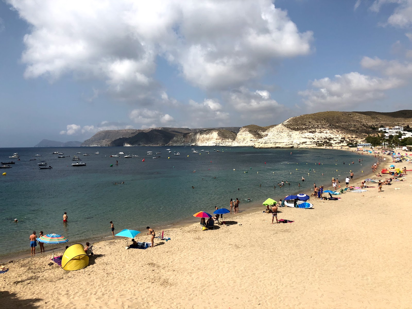 Photo of Playa Agua Amarga with brown sand surface