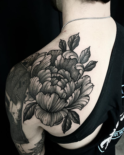 Explore japanese tattoo ideas for men, creative tattoo ideas in Austin, available at TOUGH TIGER TATTOO