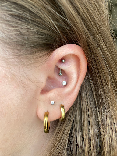 Explore hellsing tattoo ideas, creative tattoo ideas in Memphis, available at Rose Quartz Body Adornment LLC