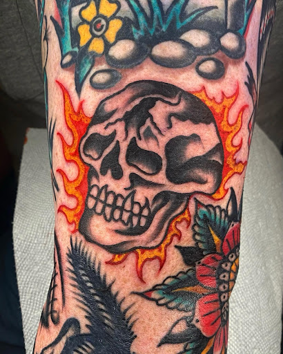 Find joker tattoo ideas for men for your next unique tattoo in Johnson City at Gold Cross Tattoo Co.