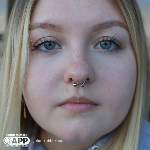 Explore face tattoo ideas male, creative tattoo ideas in Fort Myers, available at Tiger Lotus Tattoo and Piercing