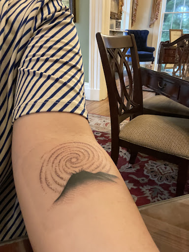 Explore snoopy tattoo ideas, creative tattoo ideas in Savannah, available at Anonymous Tattoo