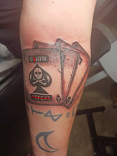 Explore leg tattoo idea for men, creative tattoo ideas in Donnellson, available at Red Hot Ink