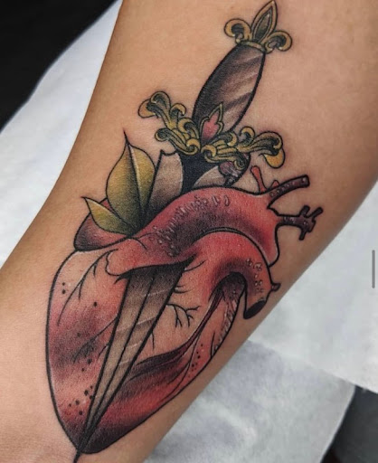 Explore inner arm tattoo ideas for guys, creative tattoo ideas in Deerfield Beach, available at Black Rose Tattoo Studio