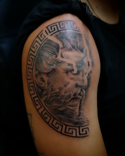 Explore men's clock tattoo ideas, creative tattoo ideas in Corcoran, available at La Raza Tattoo 2