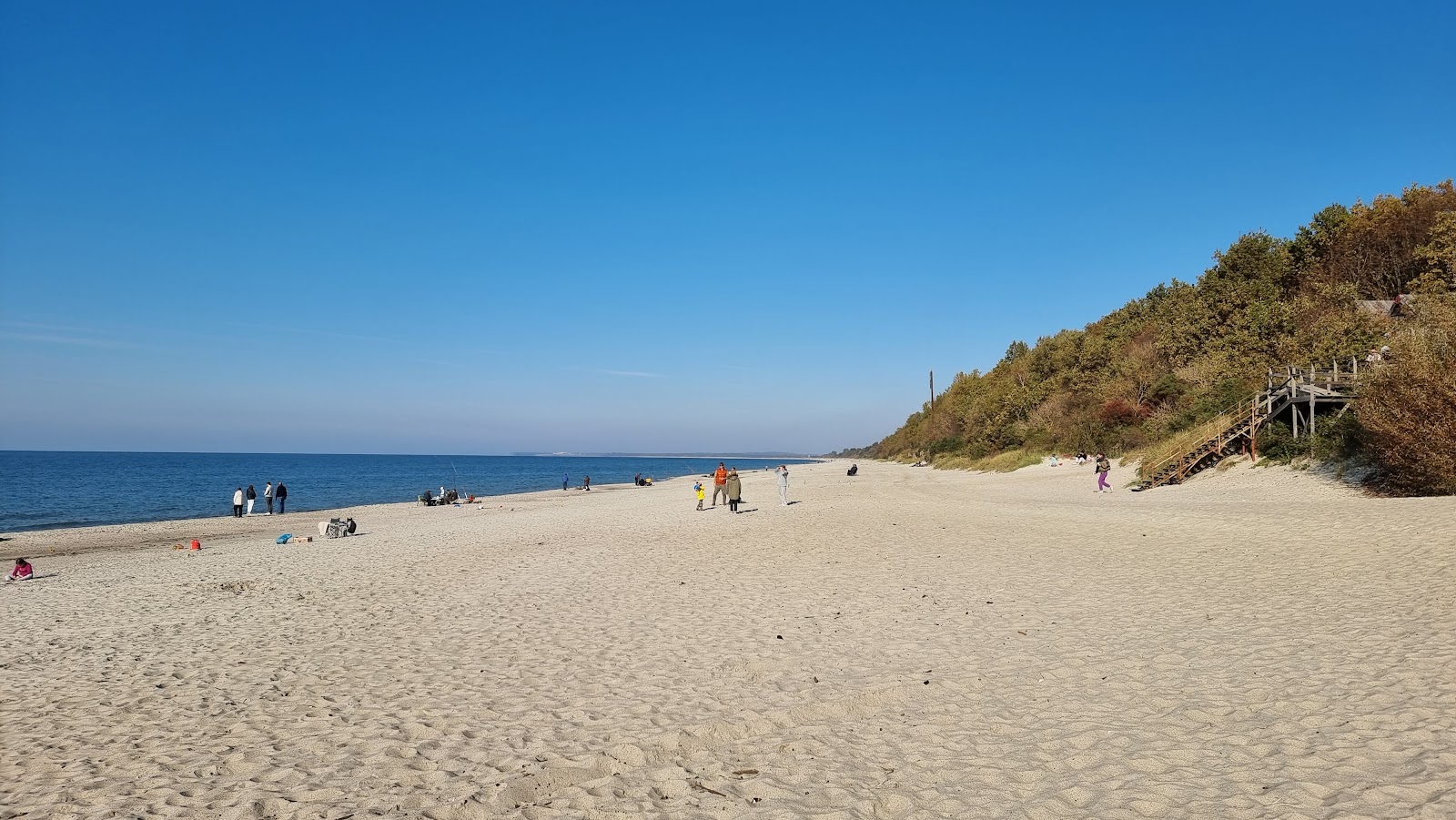 Photo of Vitland beach with long straight shore