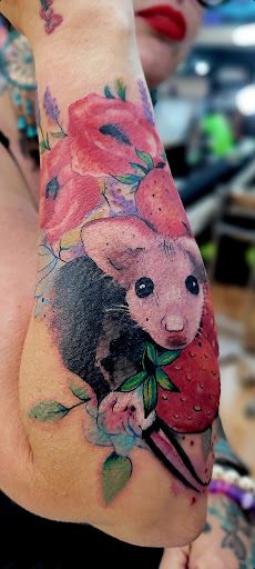 Explore collar bone tattoo ideas for women, creative tattoo ideas in Benton, available at Spectrum Tattoo