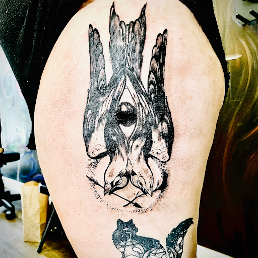 Explore tattoo ideas for karma, creative tattoo ideas in Lake City, available at Crooked Spines Tattoo Studio