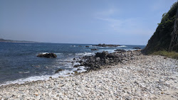 Foto av Tijera beach omgiven av berg