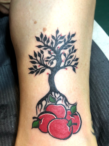 Explore back ear tattoo ideas, creative tattoo ideas in Cape Coral, available at UNRIVALED INK