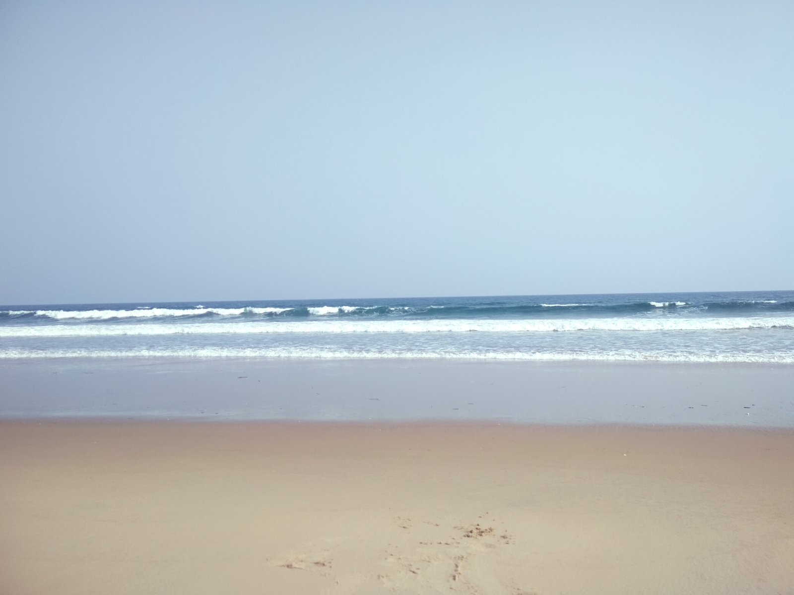 Foto av Ratti Beach med lång rak strand