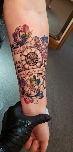 Explore hopeless romantic tattoo ideas, creative tattoo ideas in Cornelia, available at Prismatic Pulse Tattoo