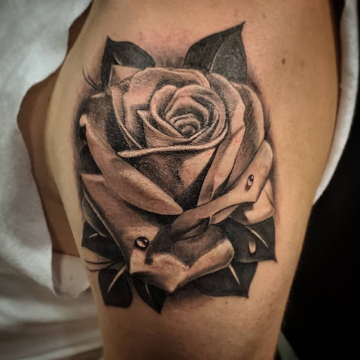 Explore hand mens tattoo ideas, creative tattoo ideas in Kenosha, available at Kenosha Tattoo Company