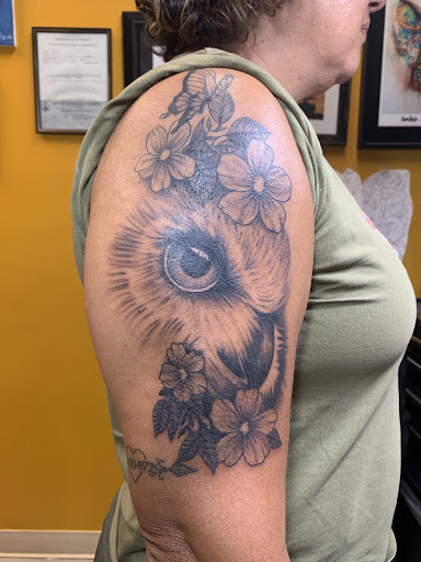 Explore last name tattoos ideas, creative tattoo ideas in Brunswick, available at Blue Fin Tattoos