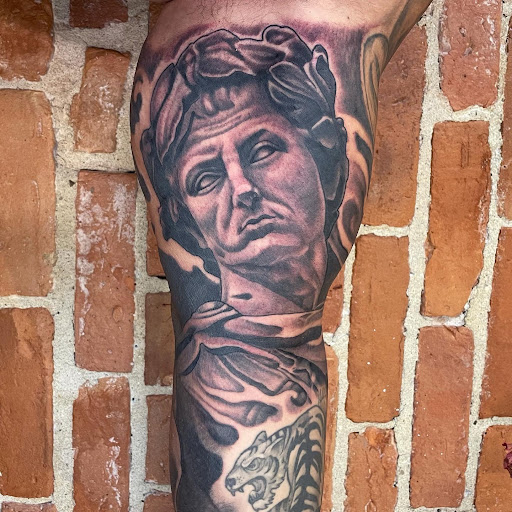 Explore picasso tattoo ideas, creative tattoo ideas in Buffalo, available at The Tilted Rose Tattoo