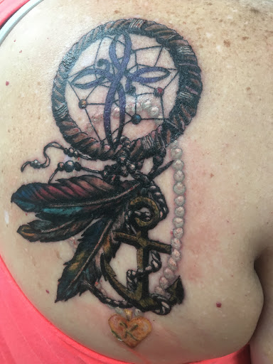 Explore sza tattoo ideas, creative tattoo ideas in Kingsland, available at Sea Of Ink Tattoo & Piercing Studio