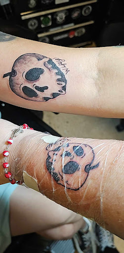 Explore charm tattoo ideas, creative tattoo ideas in Spartanburg, available at Lucky Dice Tattoo Shop Spartanburg