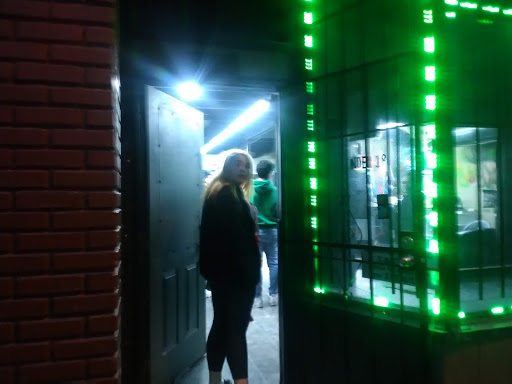 Tattoo Shop «Shrunkin Head Tattoo», reviews and photos, 4438 St John Ave, Kansas City, MO 64123, USA