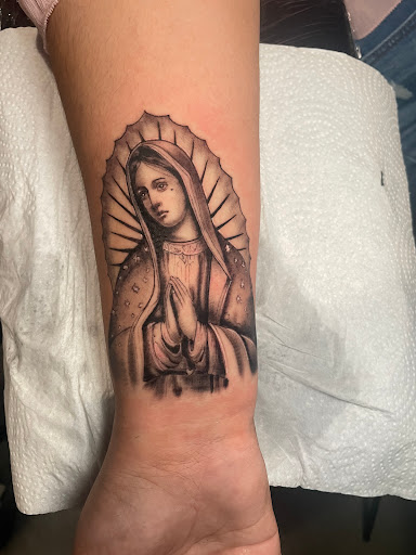 Explore sleeve tattoo ideas for women, creative tattoo ideas in Downey, available at Dotta Ink Tattoo & Piercing Parlour
