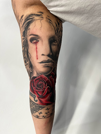 Explore tattoo ideas on back of neck, creative tattoo ideas in Minneapolis, available at Ink Addictionz Tattoo