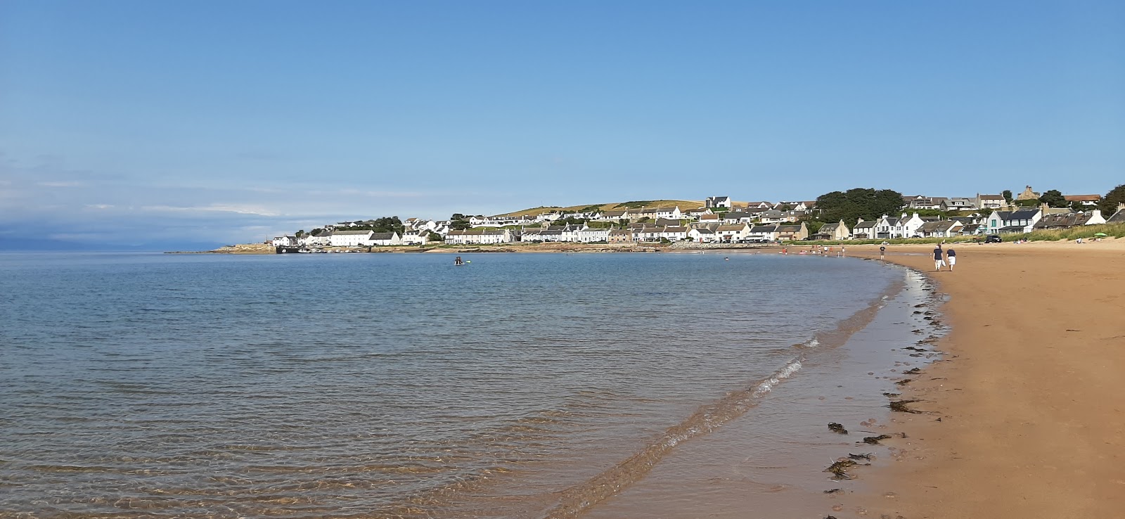 Foto di Portmahomack Beach con una superficie del sabbia beige