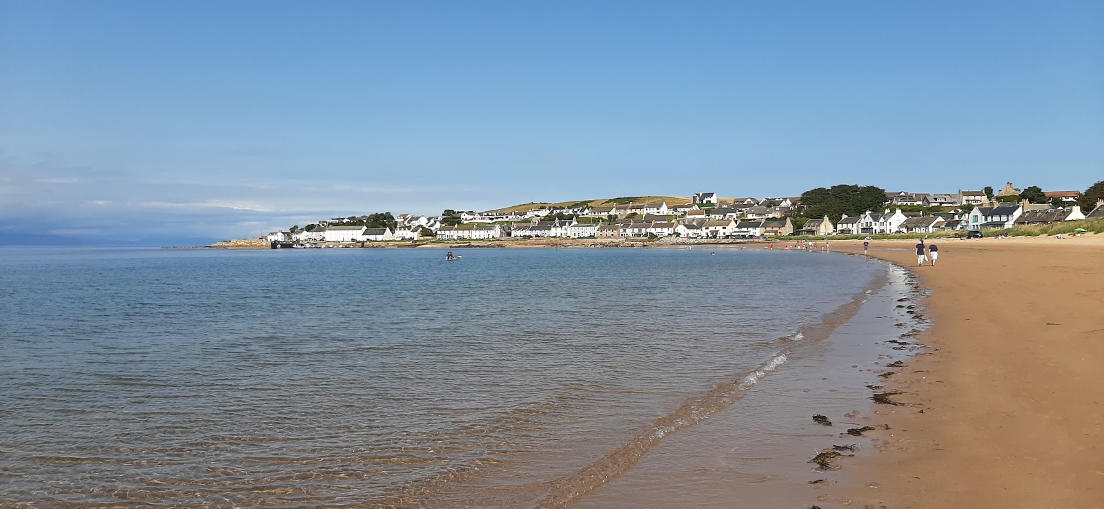 Foto di Portmahomack Beach con una superficie del sabbia luminosa