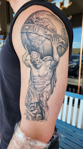 Explore moon tattoo ideas for men, creative tattoo ideas in Stuart, available at Tiger Shark Tattoo Studio