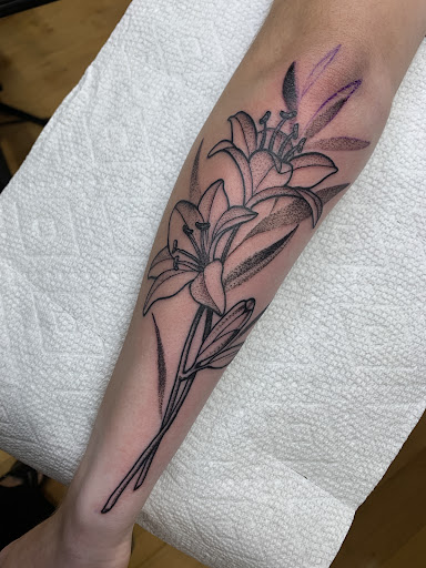 Explore wrist tattoos ideas, creative tattoo ideas in Muncie, available at Fox & Sparrow Tattoo