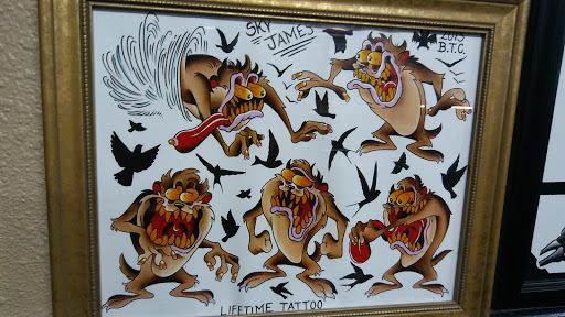 Explore kiss band tattoo ideas, creative tattoo ideas in Albuquerque, available at Por Vida Tattoo