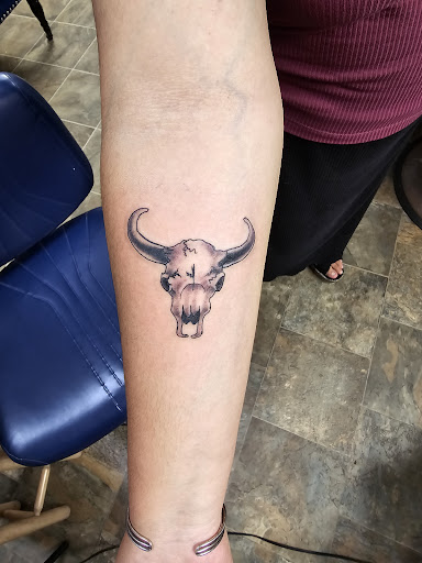 Explore tattoo of child's name ideas, creative tattoo ideas in Enid, available at IRONHORSE TATTOO & BODY PIERCING STUDIO,LLC