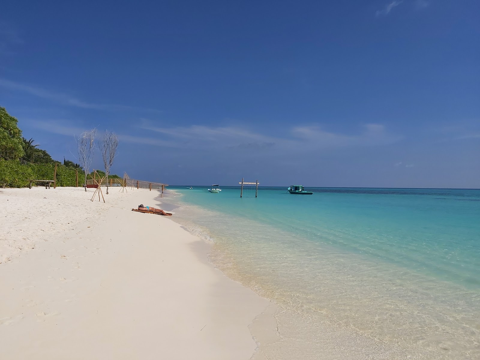 Fotografie cu Thoddu Beach cu o suprafață de apa pură turcoaz