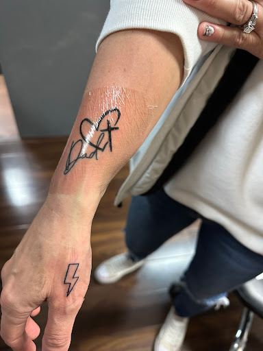 Explore skull tattoo ideas for women, creative tattoo ideas in Newfoundland, available at Okami Tattoo
