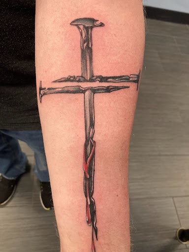 Explore back of forearm tattoo ideas, creative tattoo ideas in Palm Harbor, available at Angry Owl Tattoo and Piercing