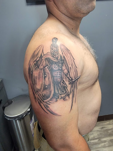 Find female breast tattoo ideas for your next unique tattoo in Athens at United Ink Tattoos and Body Piercings