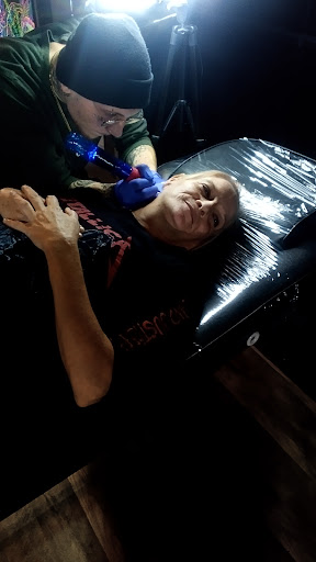 Explore two face tattoo ideas, creative tattoo ideas in Sedalia, available at NS Custom Ink