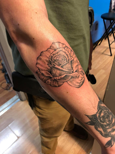 Explore lone wolf tattoo ideas, creative tattoo ideas in Jonesboro, available at Immortal Ink