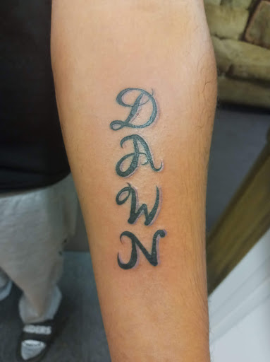 Explore calf tattoo ideas for women, creative tattoo ideas in Canon City, available at Royal Gorge Custom Tattoos & Piercings LLC