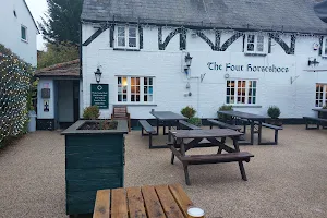 The Four Horseshoes image