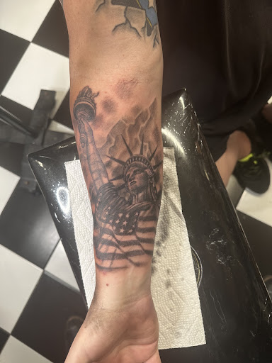 Explore calf tattoo ideas for guys, creative tattoo ideas in Georgetown, available at Iron Rite Tattoo South