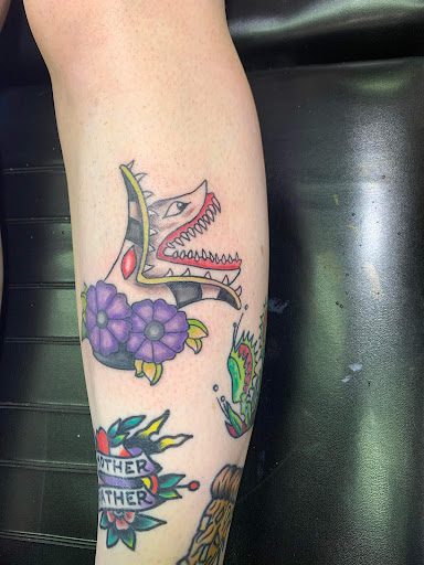 Explore tattoo ideas for dogs, creative tattoo ideas in Williamston, available at Inkd Tattoo Parlor