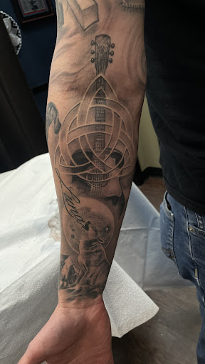 Explore black and gray tattoo ideas, creative tattoo ideas in Willis, available at Half Pint Tattoo Studio