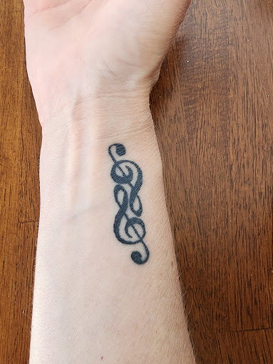 Explore bi tattoo ideas, creative tattoo ideas in Debary, available at Divine Line Tattoos