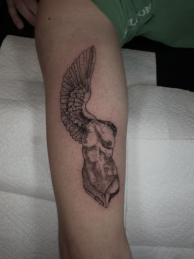 Explore tattoo behind ear ideas, creative tattoo ideas in Johnson City, available at Gold Cross Tattoo Co.