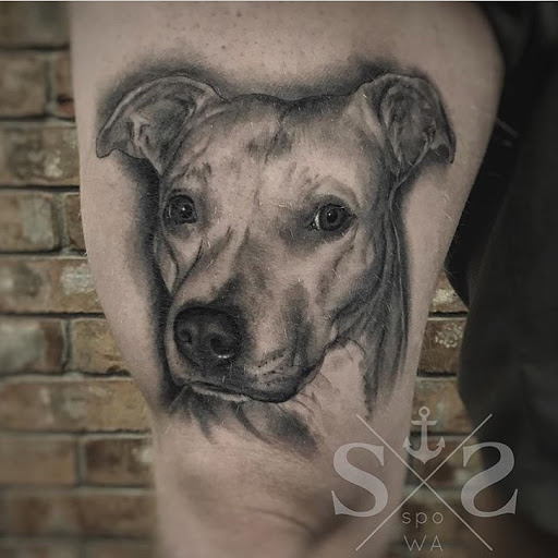 Explore leg tattoo idea for men, creative tattoo ideas in Spokane, available at Anchored Art Tattoo