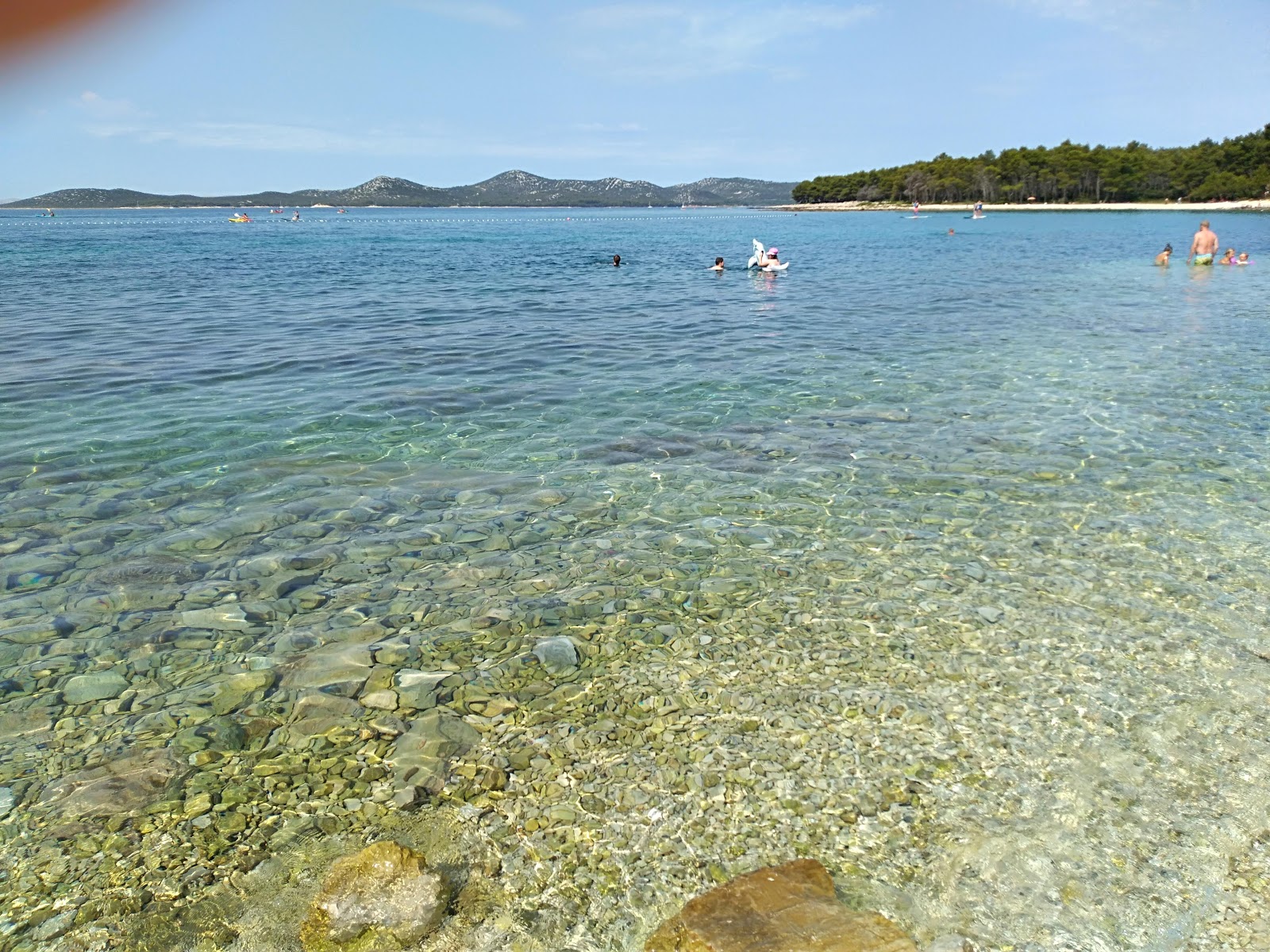 Foto von Pilatusha beach und seine wunderschöne Landschaft