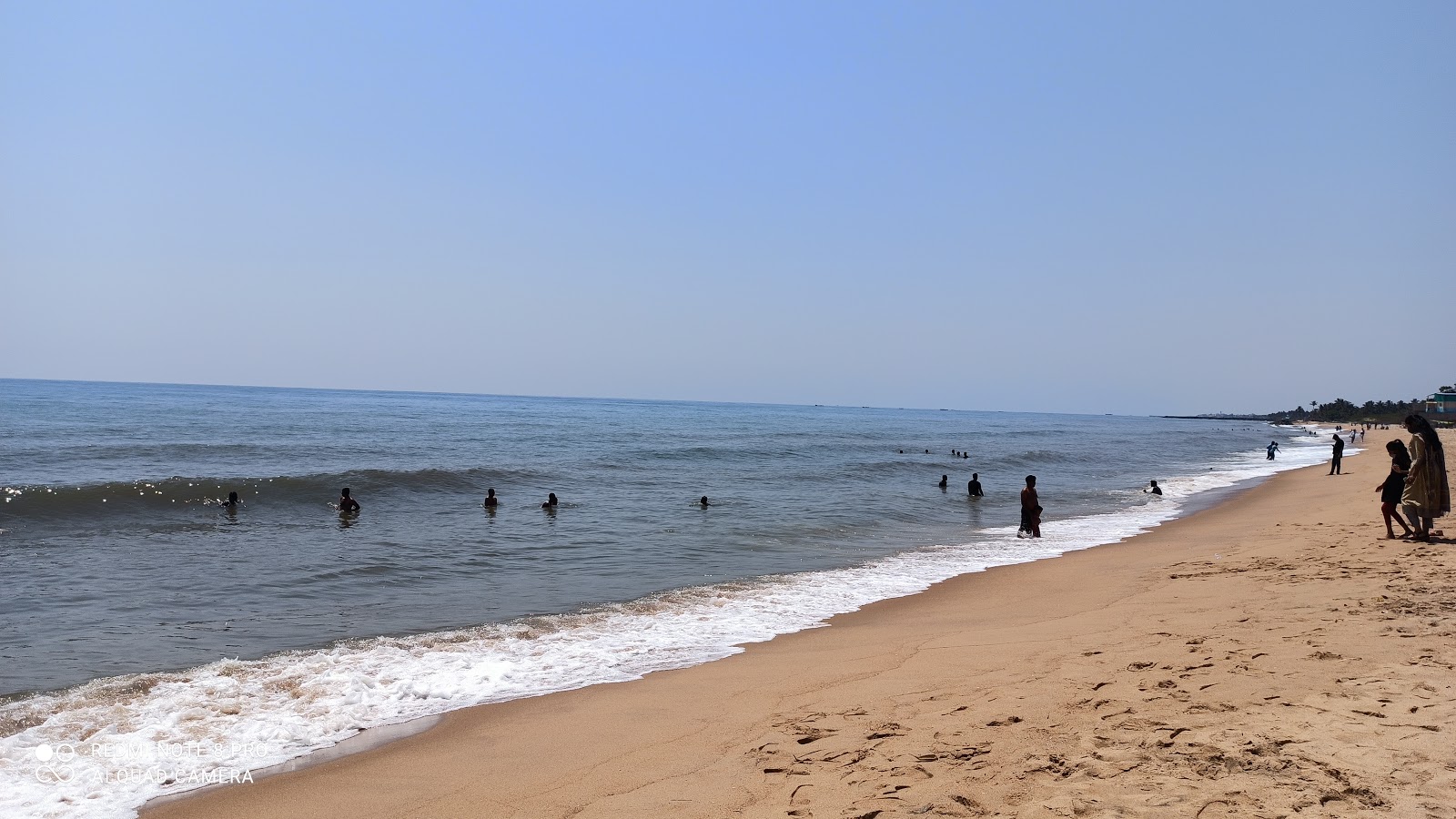 Auroville Beach的照片 带有长直海岸