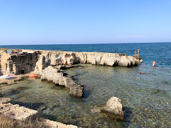 Photo de Spiaggia di Torre Cintola avec plusieurs baies spacieuses